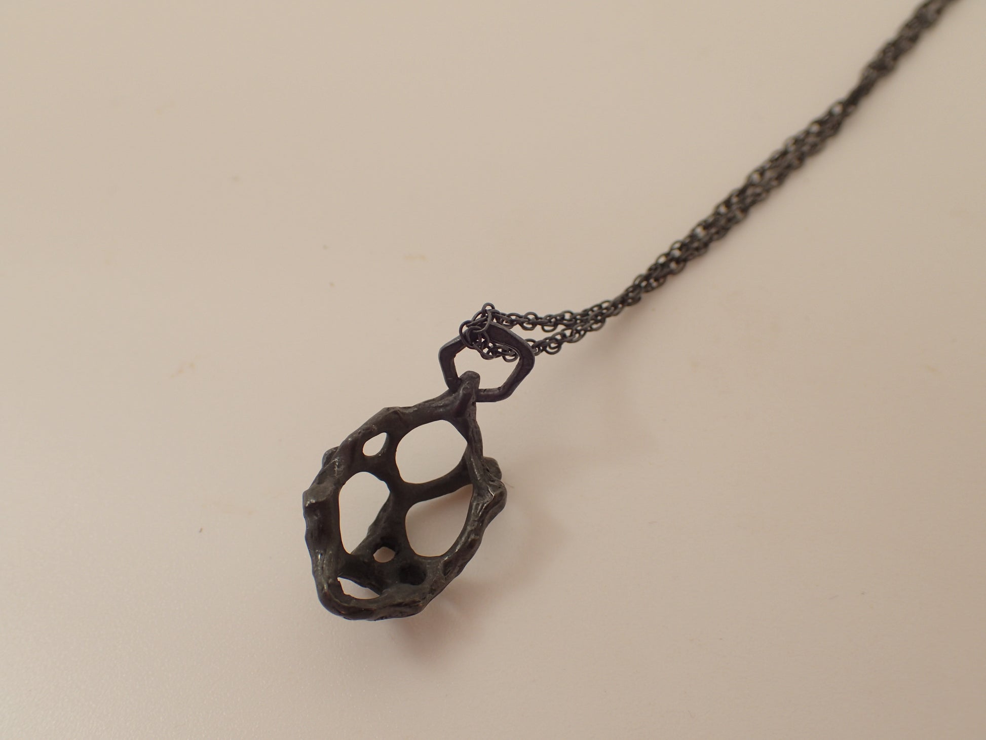 Carved honeycomb cage pendant. Oxidised silver necklace.-Jewellery-Beca Beeby