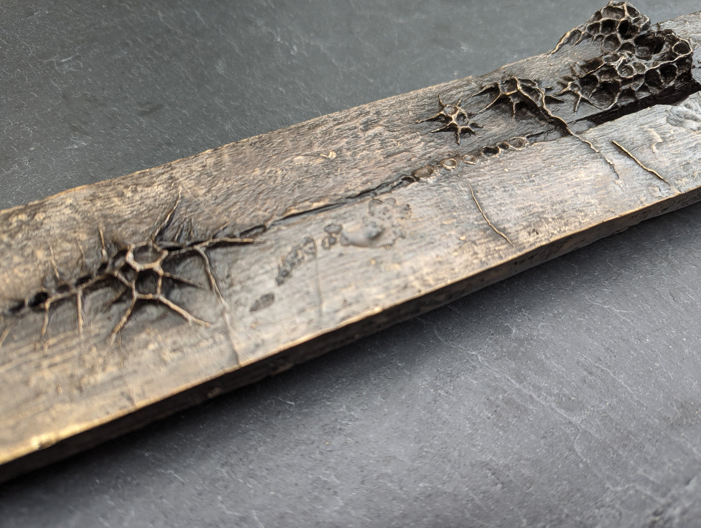 10 years. Bronze.-sculpture (wall)-Beca Beeby