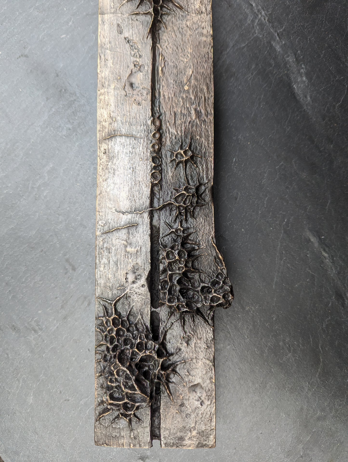10 years. Bronze.-sculpture (wall)-Beca Beeby