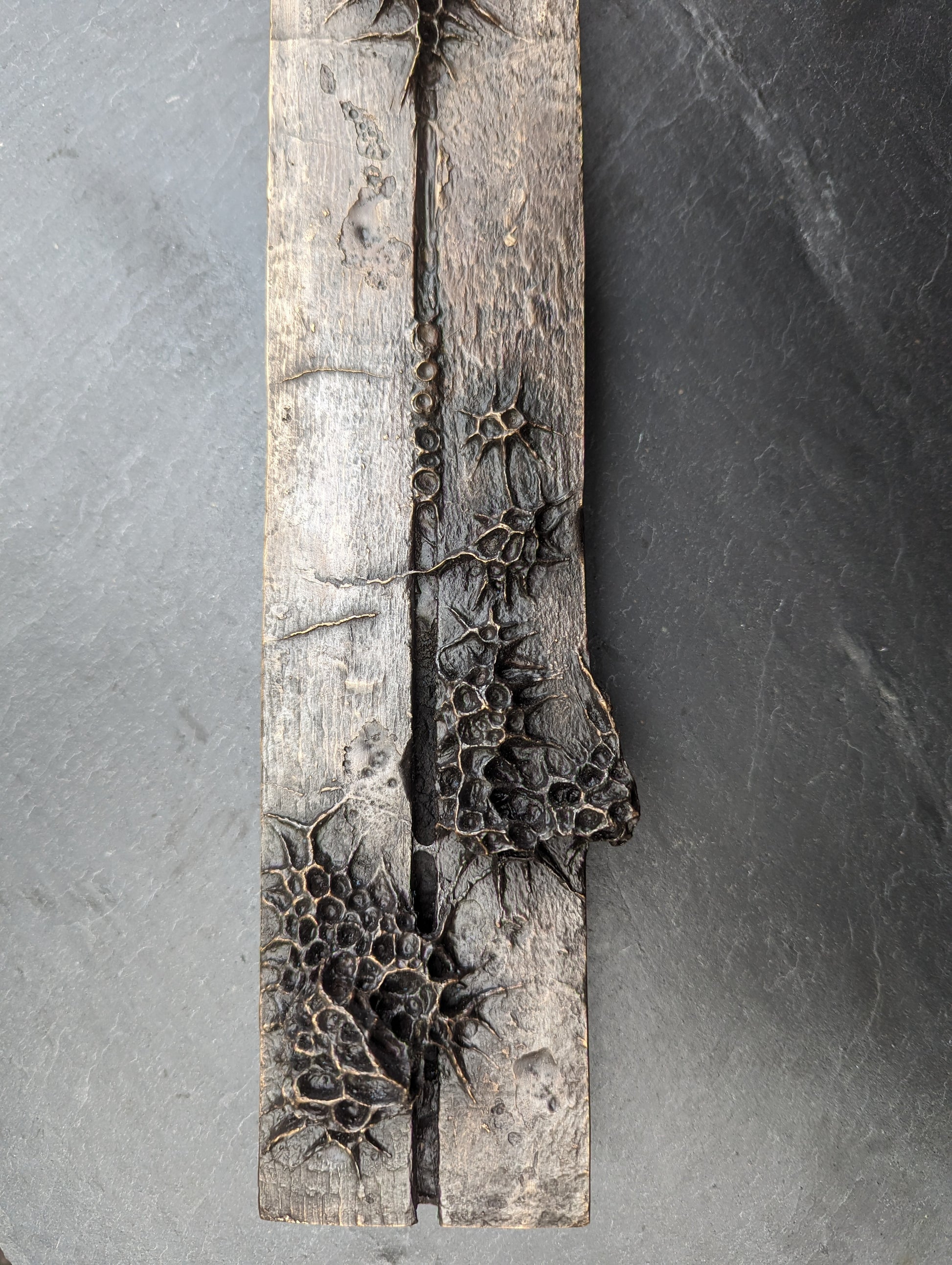 10 years. Bronze.-sculpture (wall)-Beca Beeby