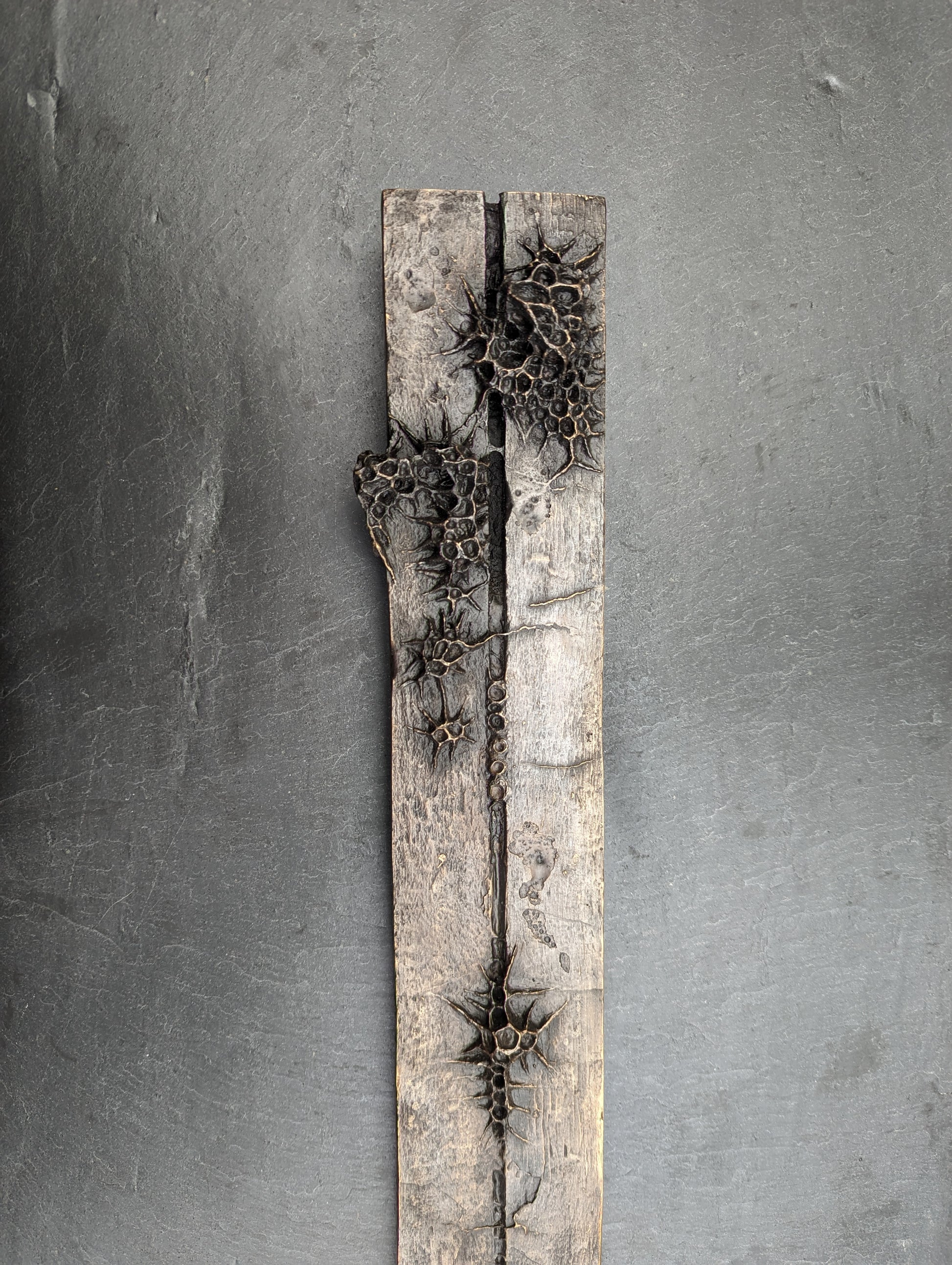10 years. Bronze.-sculpture (wall)-Beca Beeby
