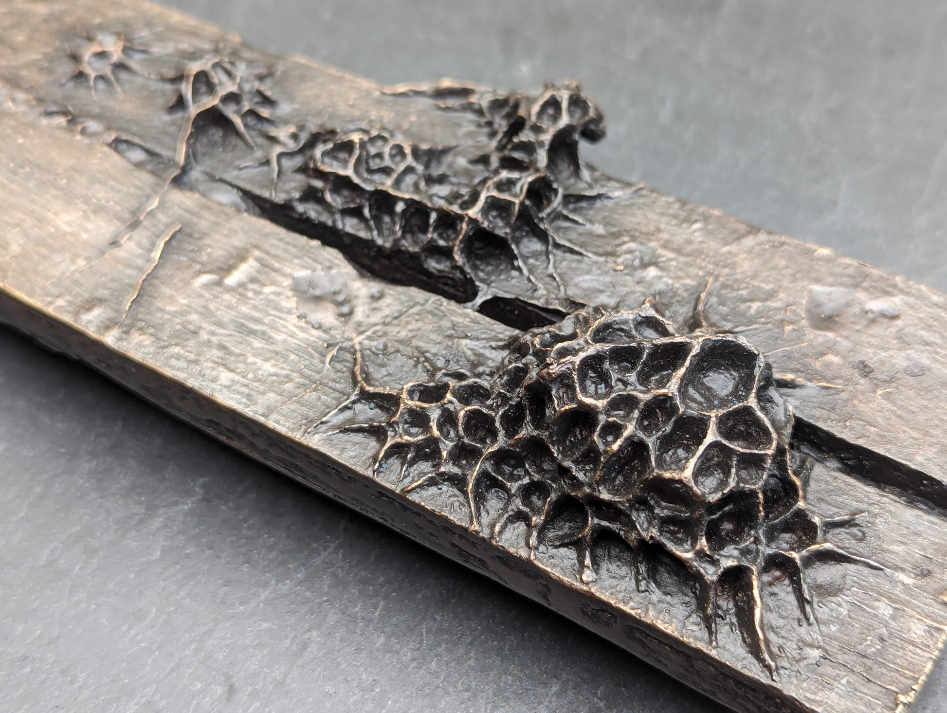 10 years. Bronze.-sculpture (wall)-Beca Beeby
