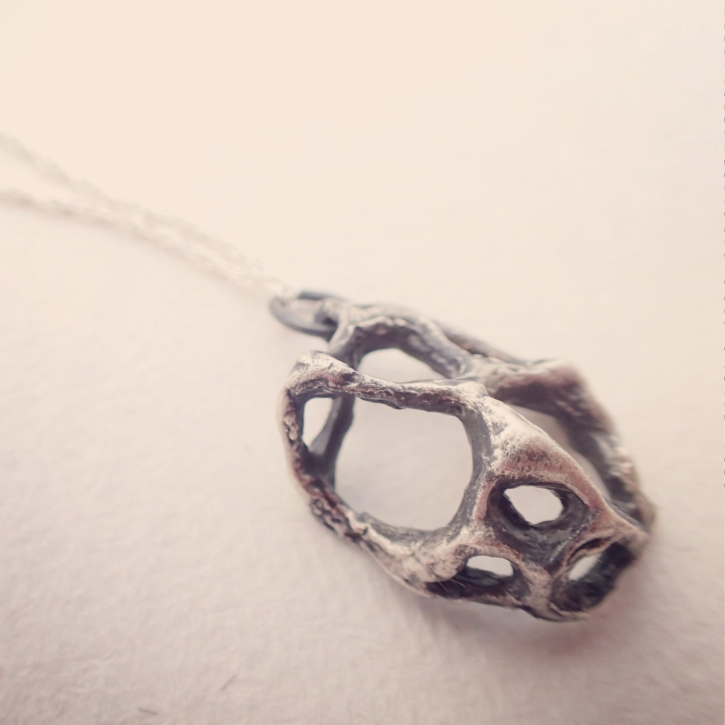 Carved honeycomb cage pendant. Oxidised silver necklace.-Jewellery-Beca Beeby